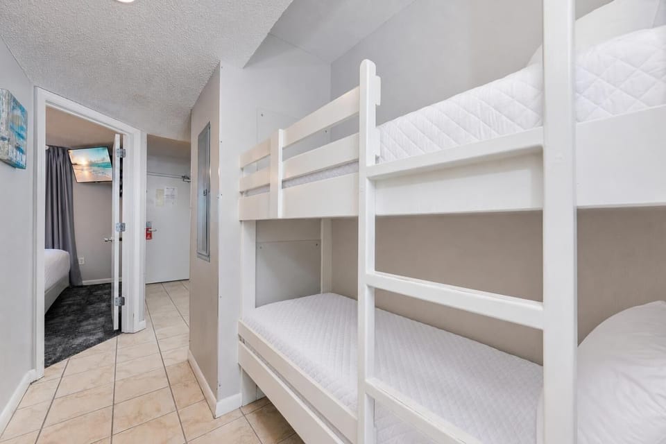 Bunk beds in the hallway offer a cozy spot for the kids after fun-filled days along the coast