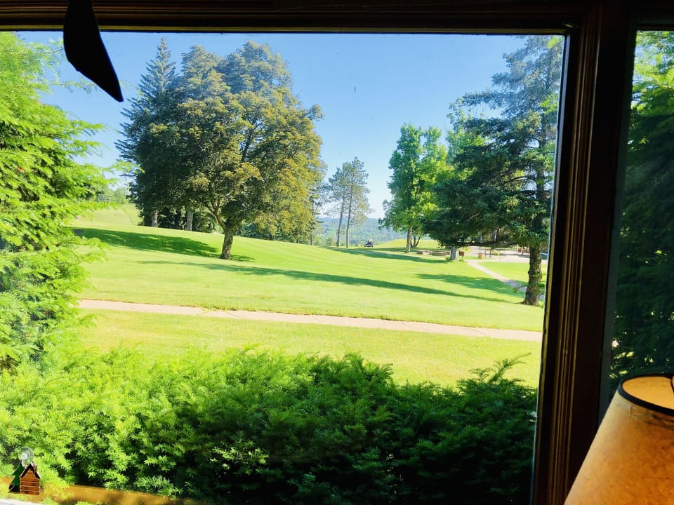 Amazing view from from unit of golf course, ski hill, lodge!