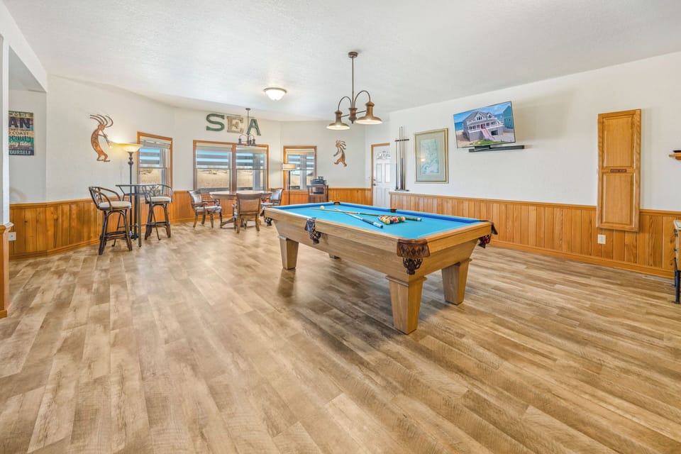 Challenge the competition to a riveting round of pool in the ground level game room.