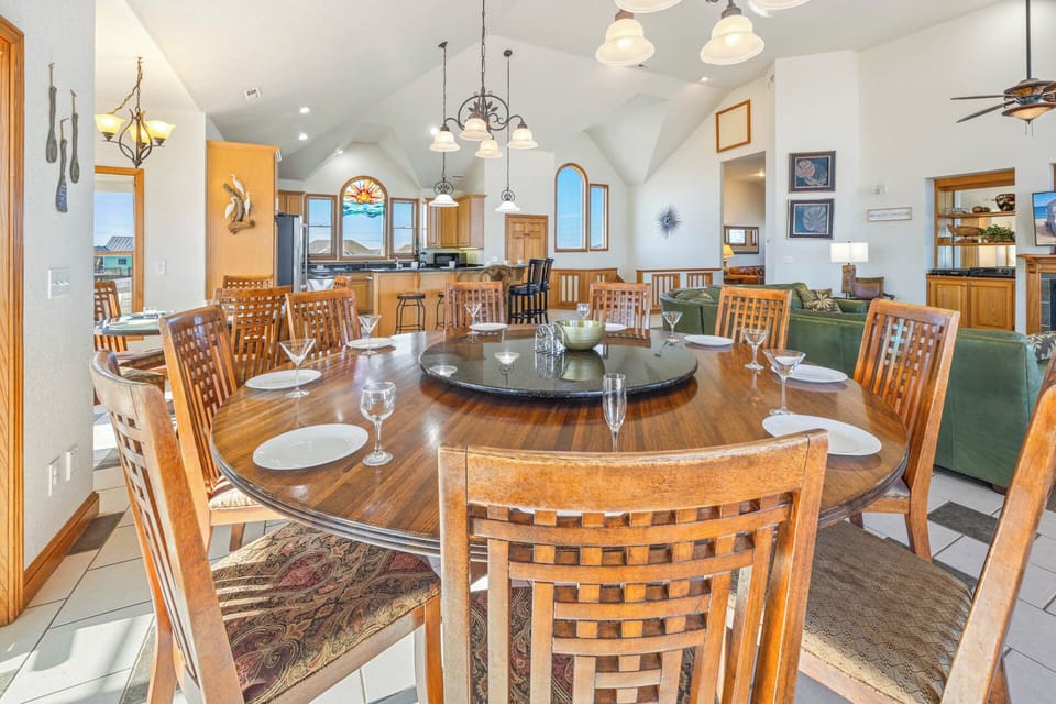 Relive the day's sunny memories at the 9-person dining table while relishing in the chef's creations and ocean views.