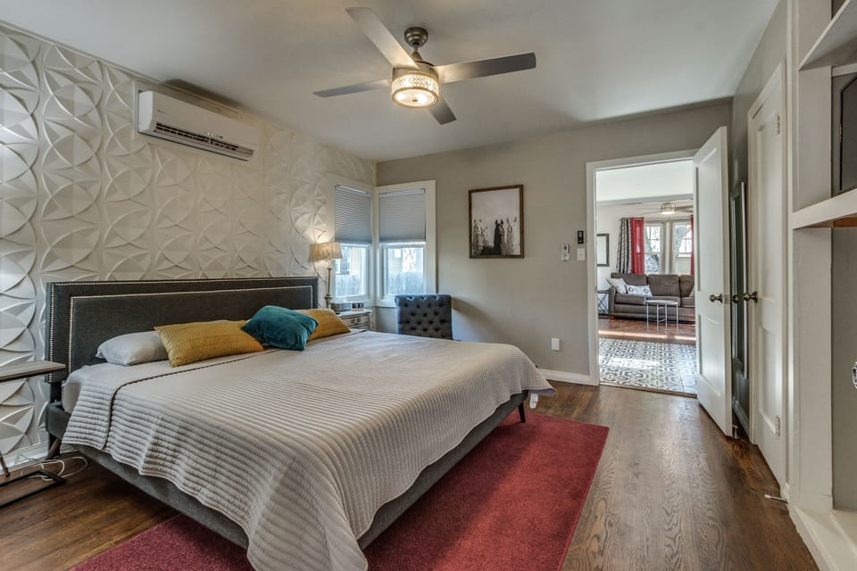 King size tempurpedic bed and TV in bedroom
