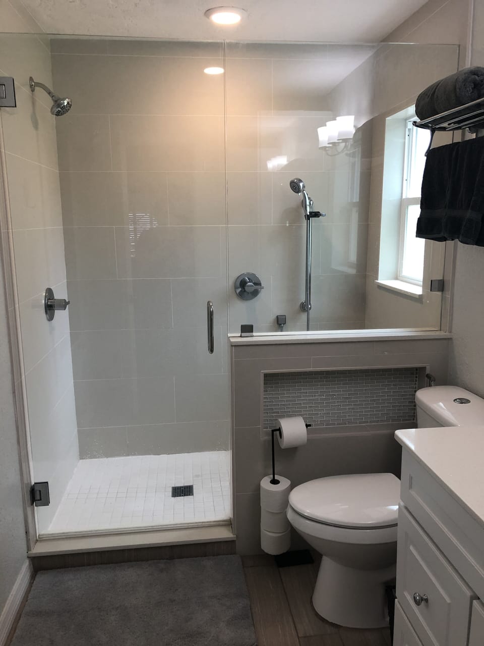 Tile shower with dual head