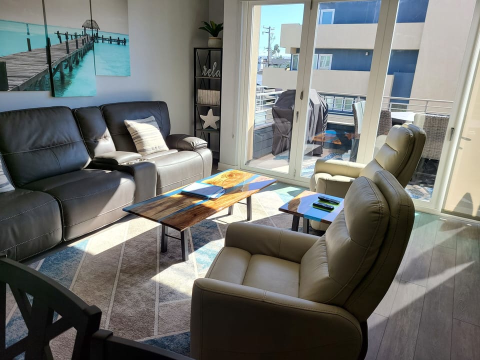 Living room with sofa recliners and 2 lazy boys