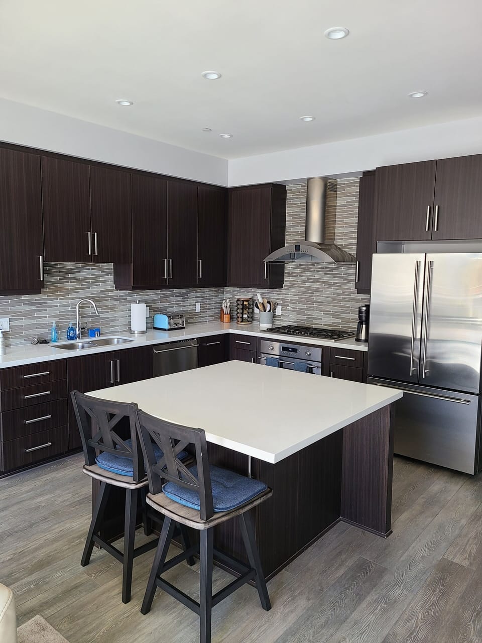Kitchen with GE Monogram appliances and large Island