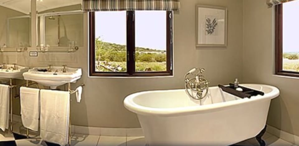 Long Hope Villa | Bathroom | Separate tub and shower, deep soaking tub, free toiletries, hair dryer