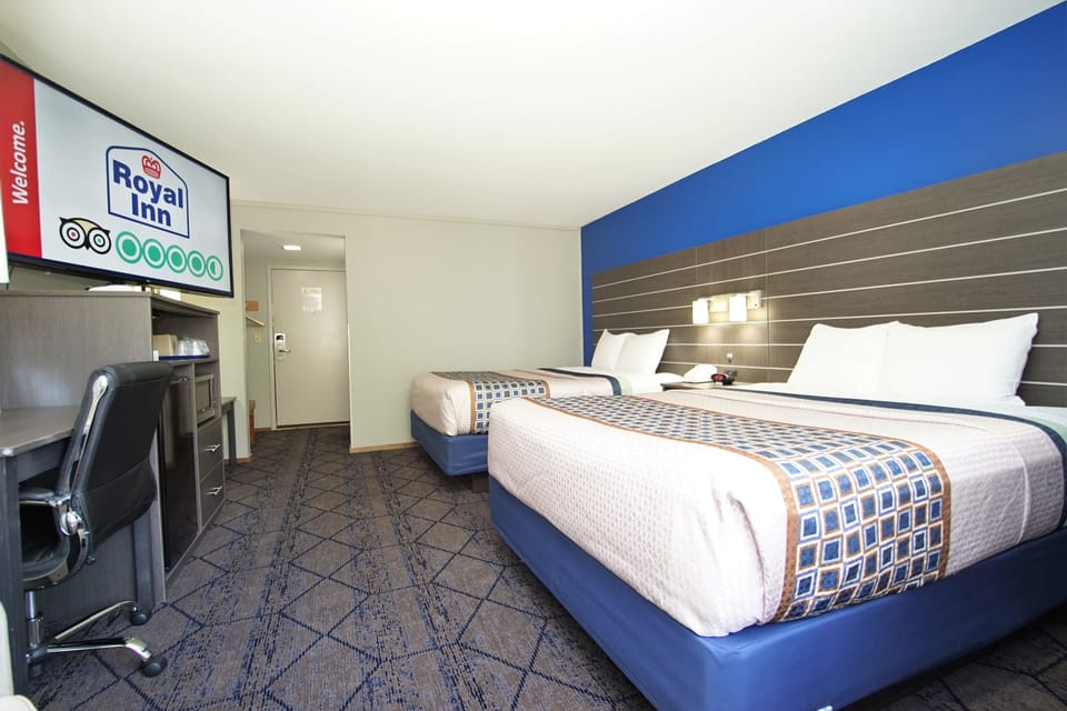 Deluxe Room, 2 Queen Beds, Non Smoking | Individually furnished, desk, blackout drapes, iron/ironing board