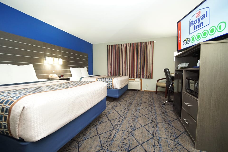Deluxe Room, 2 Queen Beds, Non Smoking | Individually furnished, desk, laptop workspace, blackout drapes