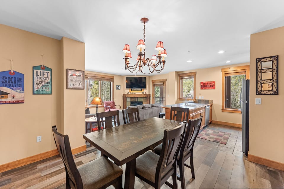 Gather around this elegant dining table where mountain memories are made over shared meals and warm conversation.