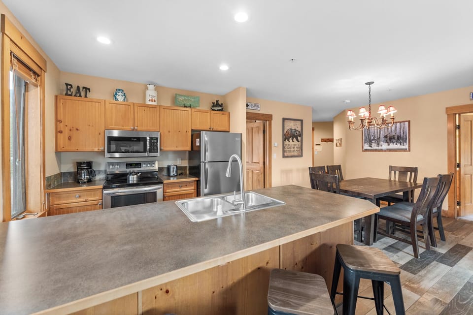 Your open kitchen flows into the dining space, making meal prep a social experience with family and friends.