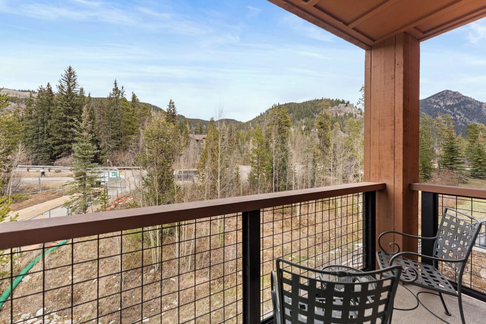 Sip your morning coffee on your private balcony while soaking in breathtaking mountain views that stretch endlessly across forested peaks.
