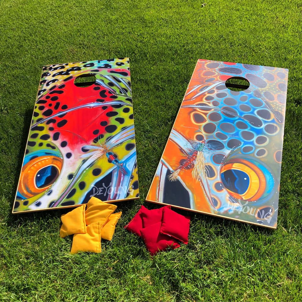 play a game of corn hole