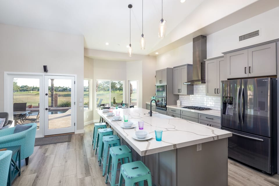 Stunning upgraded kitchen with quaility appliances, wood cabinets, & quartz.