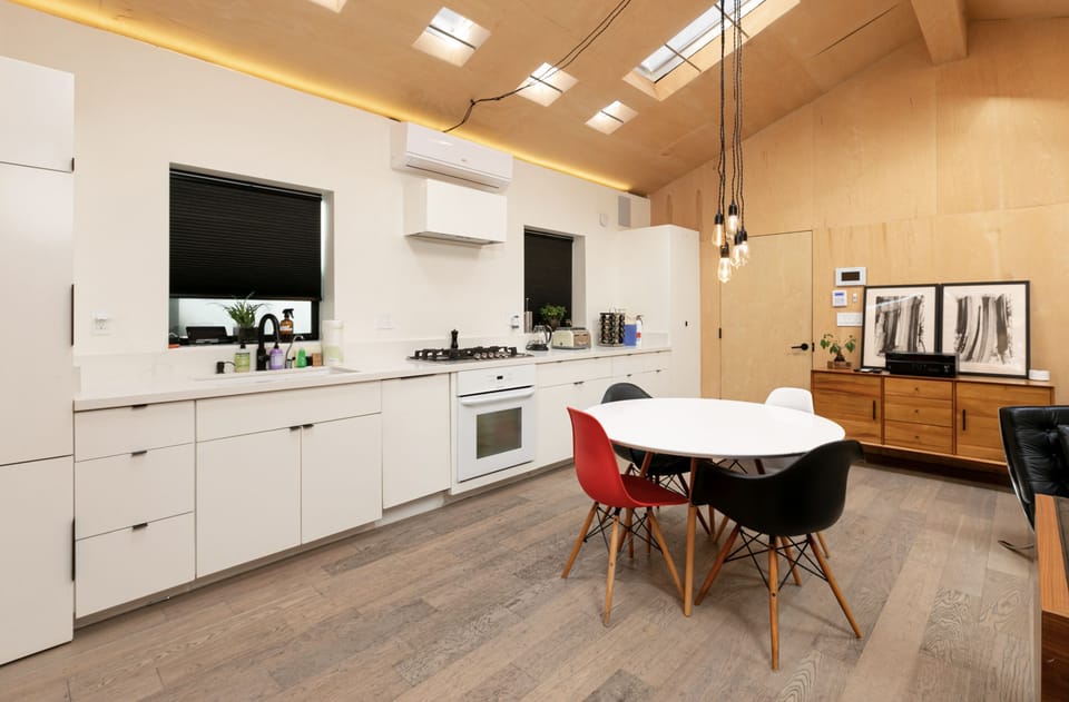 Enjoy this fully equipped kitchen and large dinning space area. 