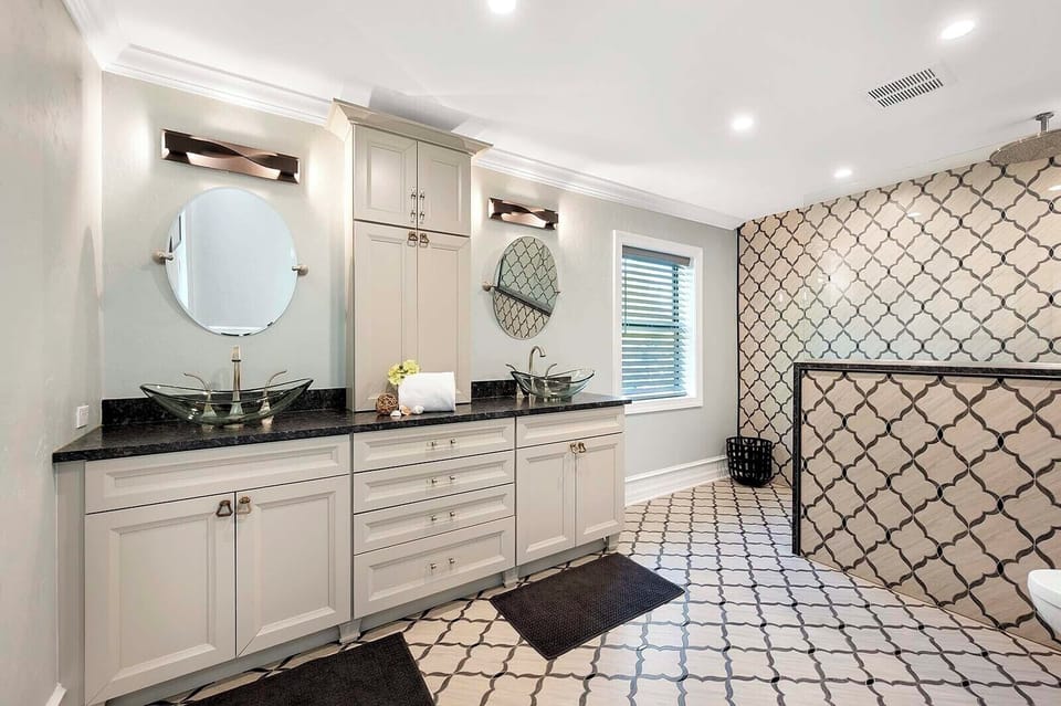 En-Suite Main Bathroom with Dual Sinks and Walk in Shower