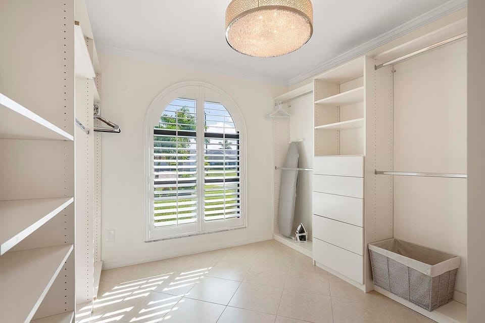 Large Walk In Closet with Plenty of Room for Your Vacation Clothes