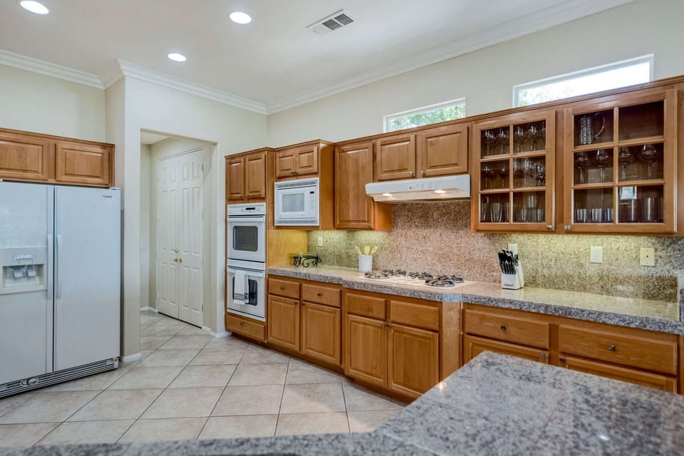 Large Kitchen area with granite countertops