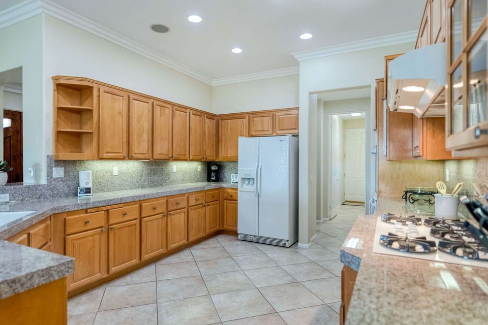 Kitchen with gas stovetop and plenty of countertops for preparing your favorite meal