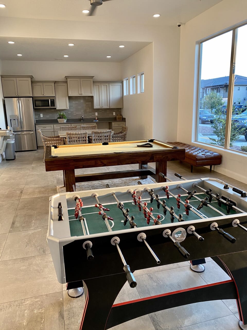 Inside the clubhouse, pool table and foosball