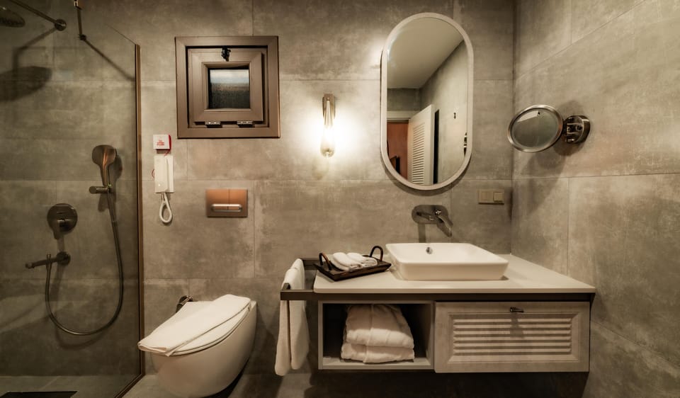 Deluxe Suite, 2 Bathrooms, Garden View | Bathroom | Shower, eco-friendly toiletries, hair dryer, slippers