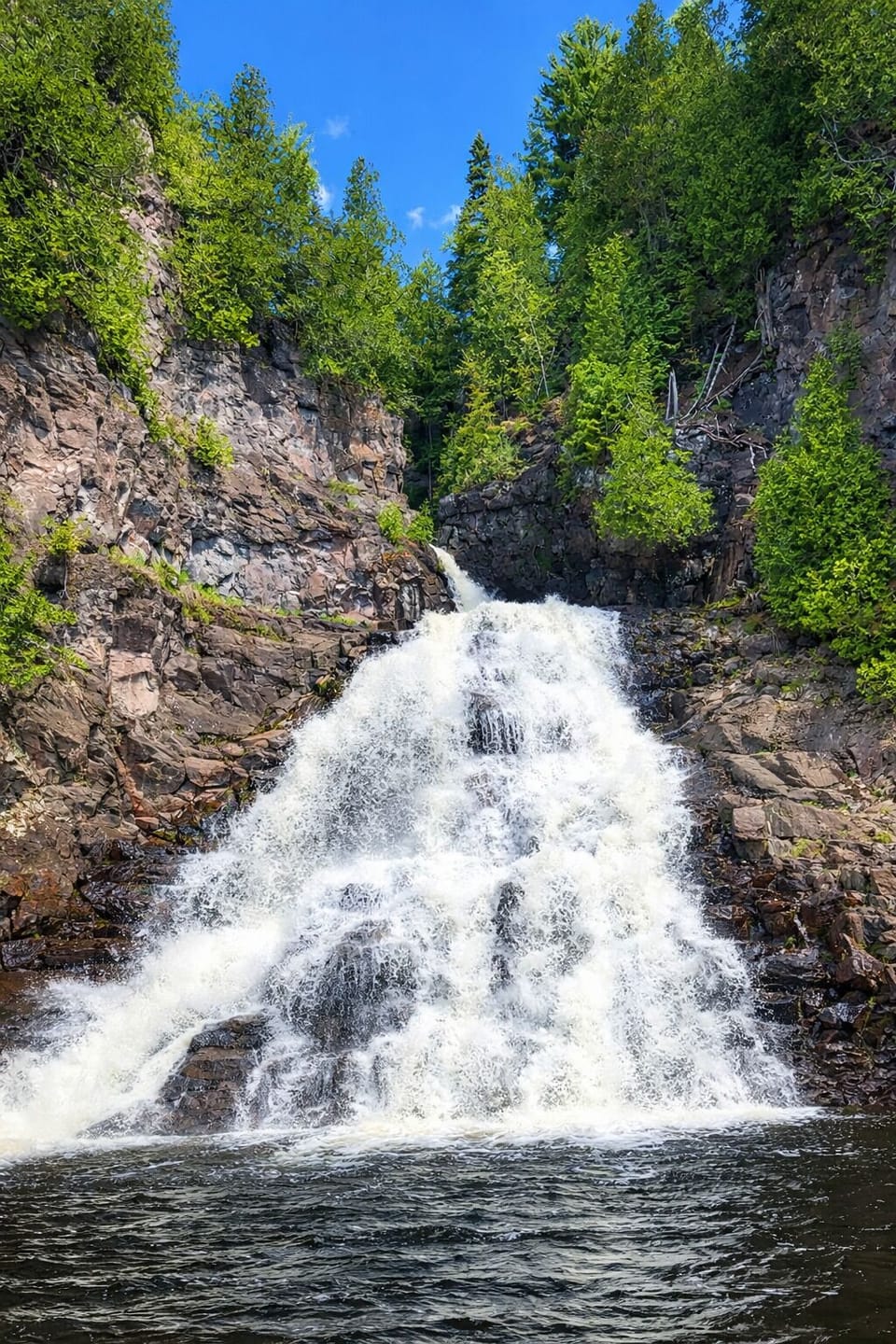Caribou Falls Wayside a beautiful waterfall where you can get close, wade near the flowing water, and enjoy a peaceful pause in nature. Just 19 minutes from Trail Shack, it’s a scenic drive along Hwy 61 and a perfect North Shore stop!