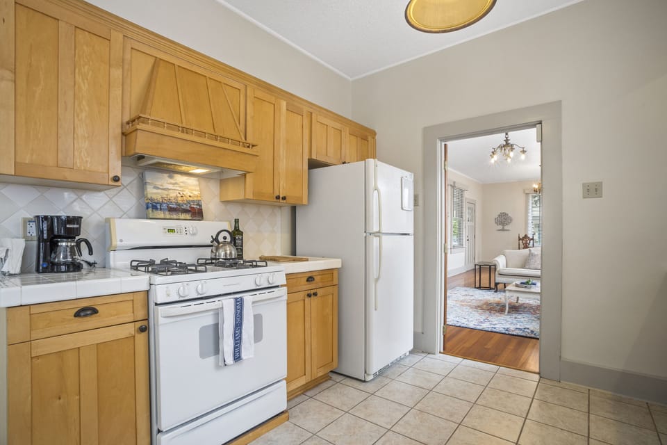 The kitchen has everything you need to cook on the gas stove.
