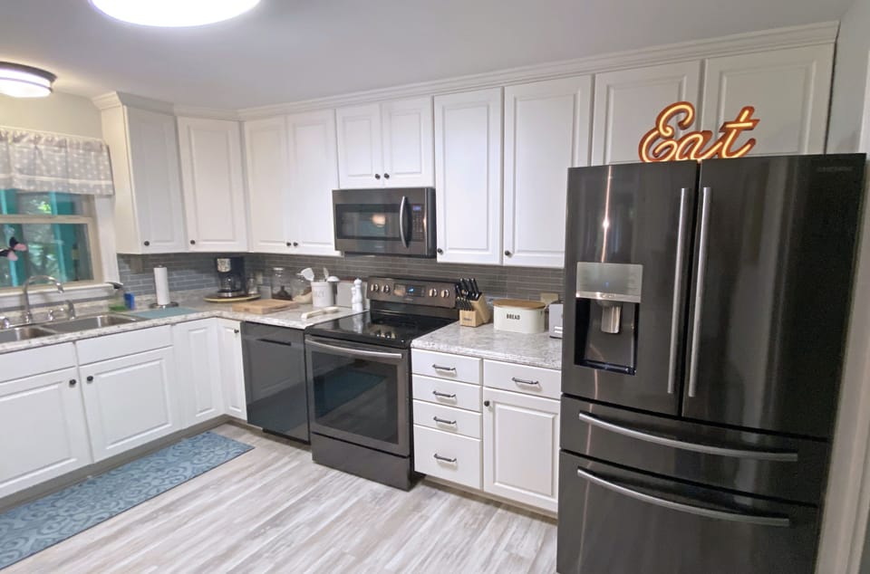 Kitchen is bright and well-equipped
