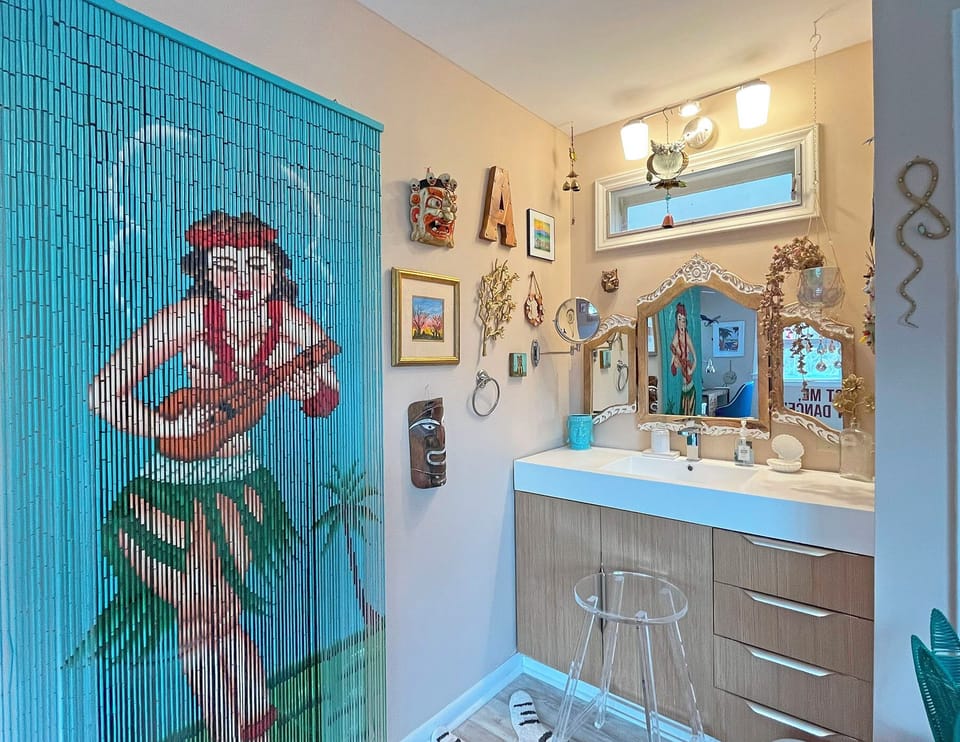 Master Bath Vanity and doorway to shower/toilet room