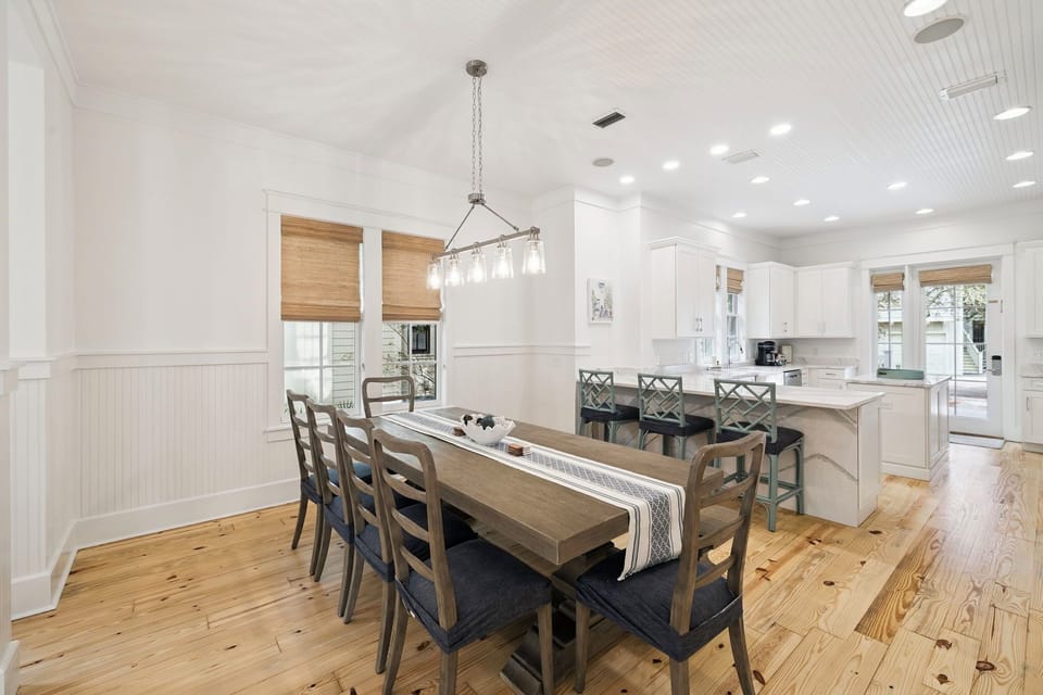 Gather around this stunning dining table where memorable meals come to life in your bright, open-concept space.
