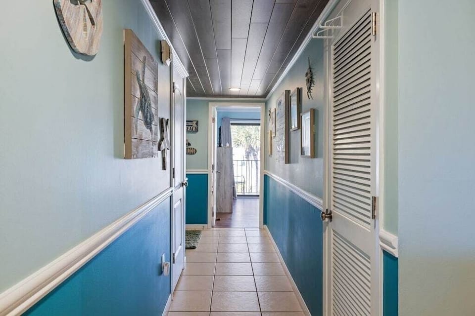 View of main hallway from living area to front queen bedroom