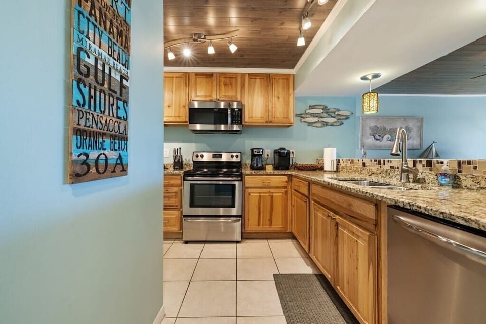 Additional view of well stocked kitchen including both Mr. Coffee pot and Keurig