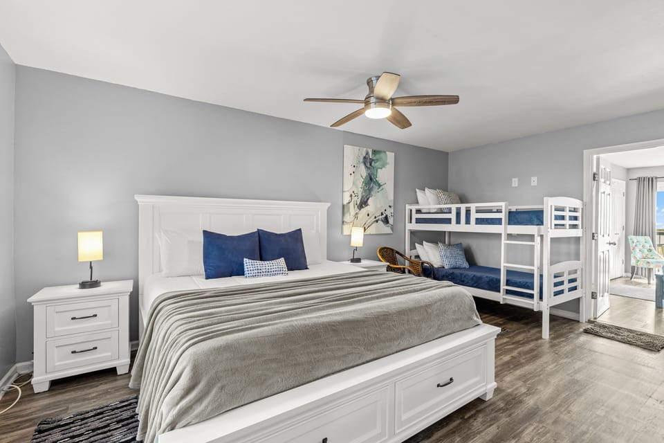 Bedroom with king bed + twin over twin bunk bed