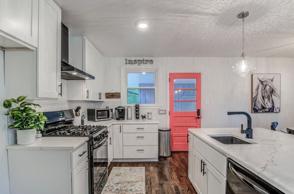 Enjoy making meals in the very functional kitchen with a great island 