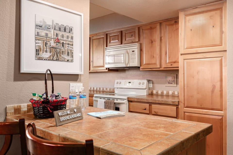 Kitchen w/oven, microwave, dishwasher & all necessary amenities.