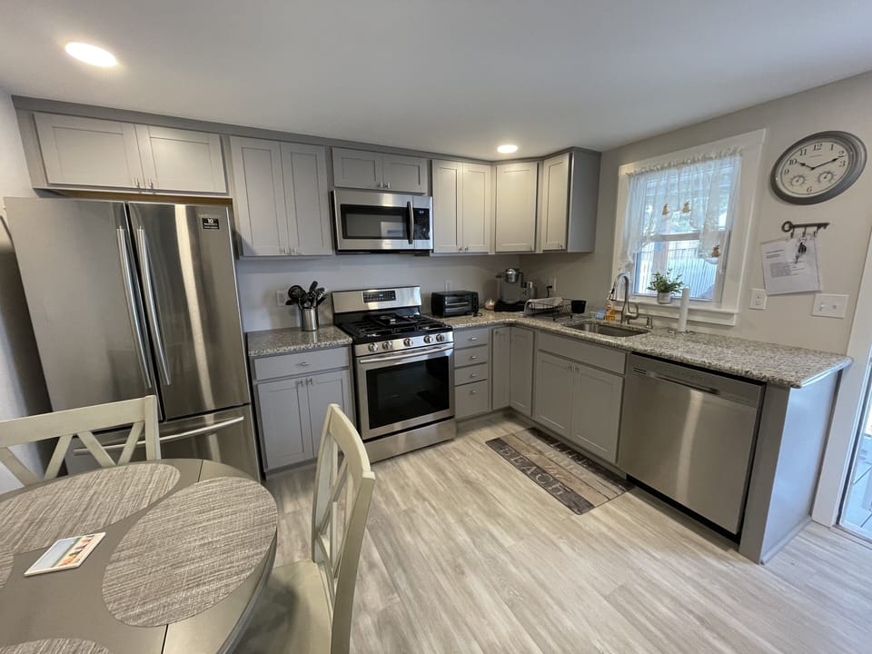 Fully renovated kitchen with all new appliances, including dishwasher