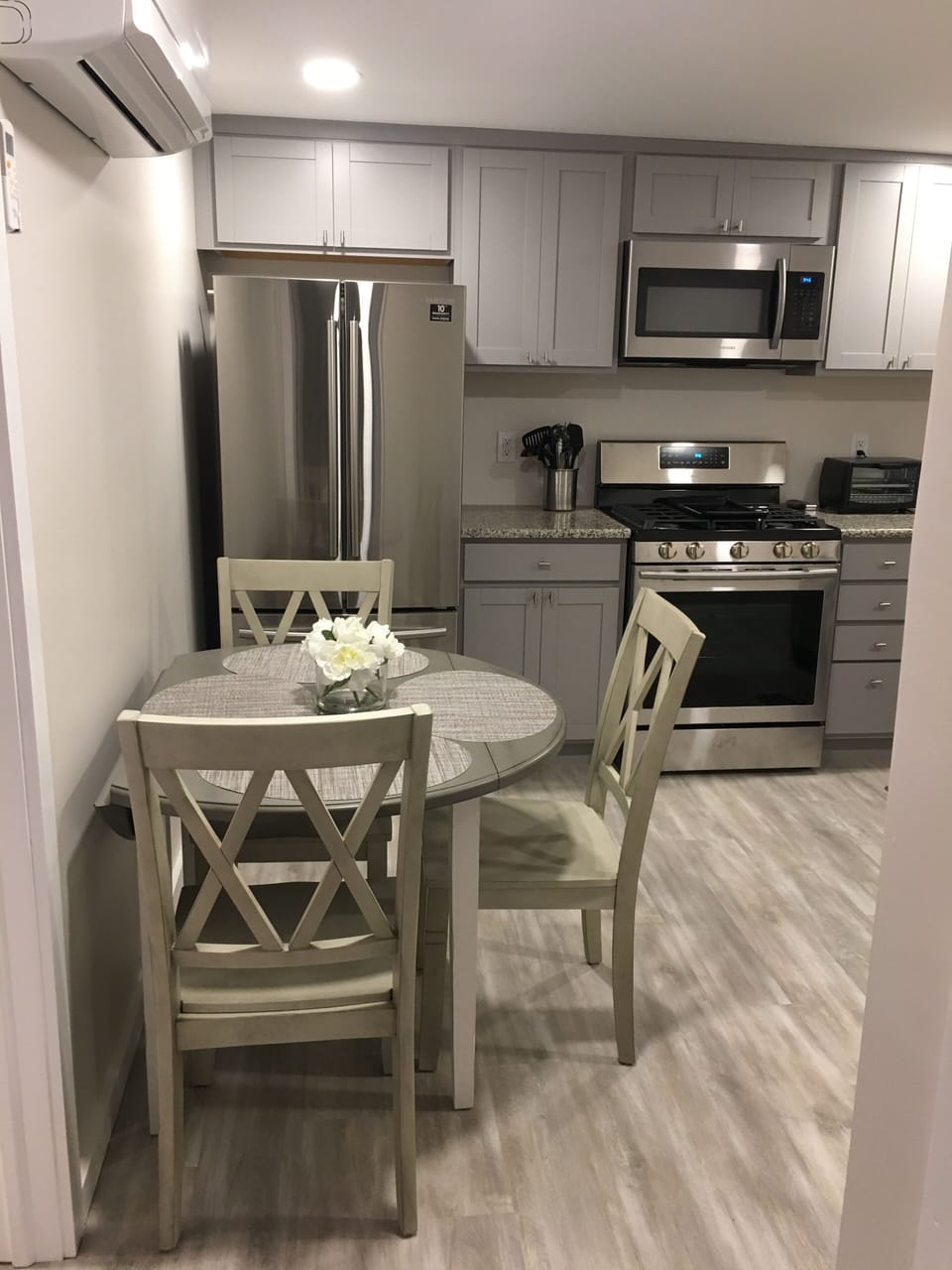 Eat-in kitchen with adjustable table to seat 4