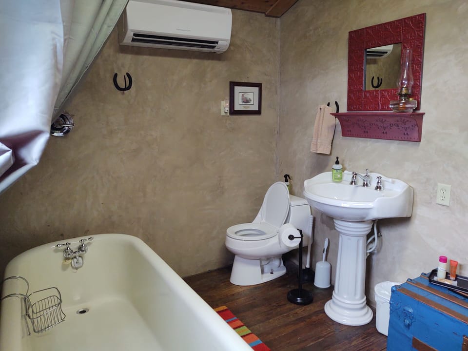 Spacious bathroom, tankless propane hot water for that relaxing soak.