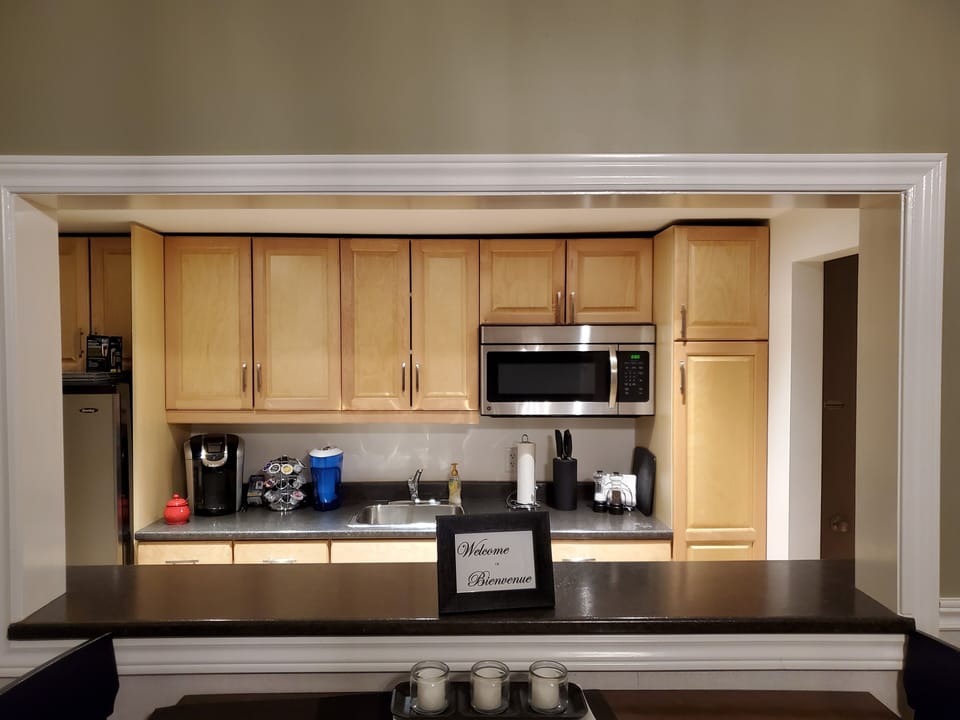 Private kitchenette with fridge and microwave
