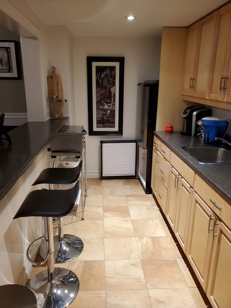 Private kitchenette with fridge, microwave & Breakfast chairs