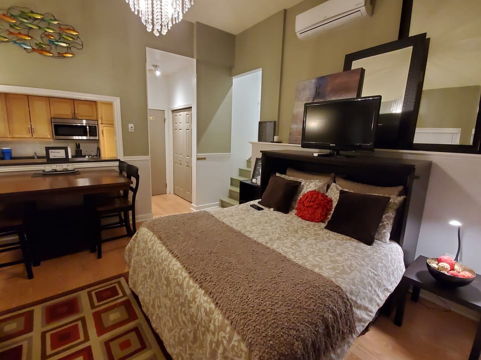 Spacious guest suite with queen-sized bed