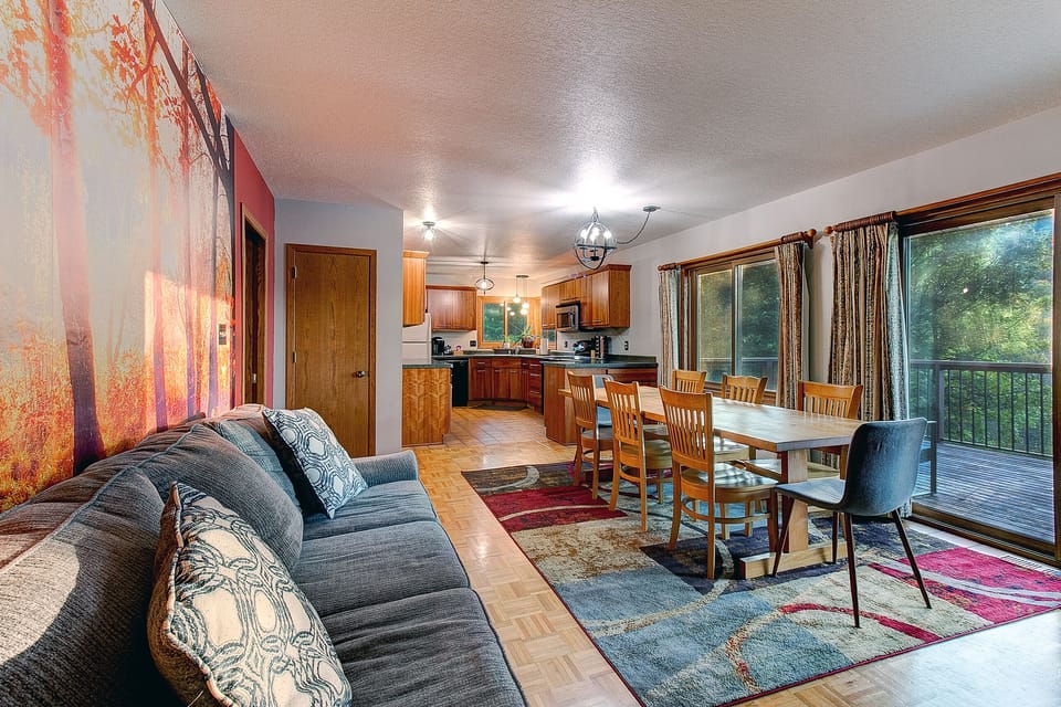 A dinner table w/ a view. The table has seating for up to 10 people.