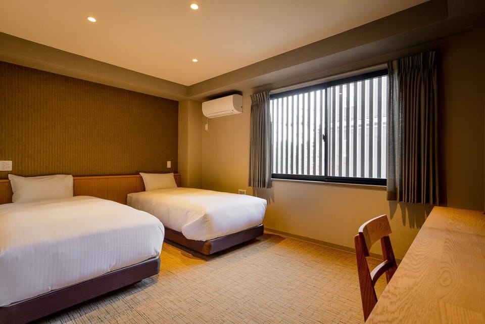 Blackout drapes, free WiFi, bed sheets