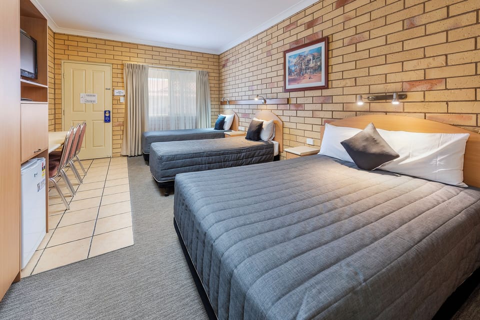 Family Room | Desk, blackout drapes, iron/ironing board, WiFi (free)