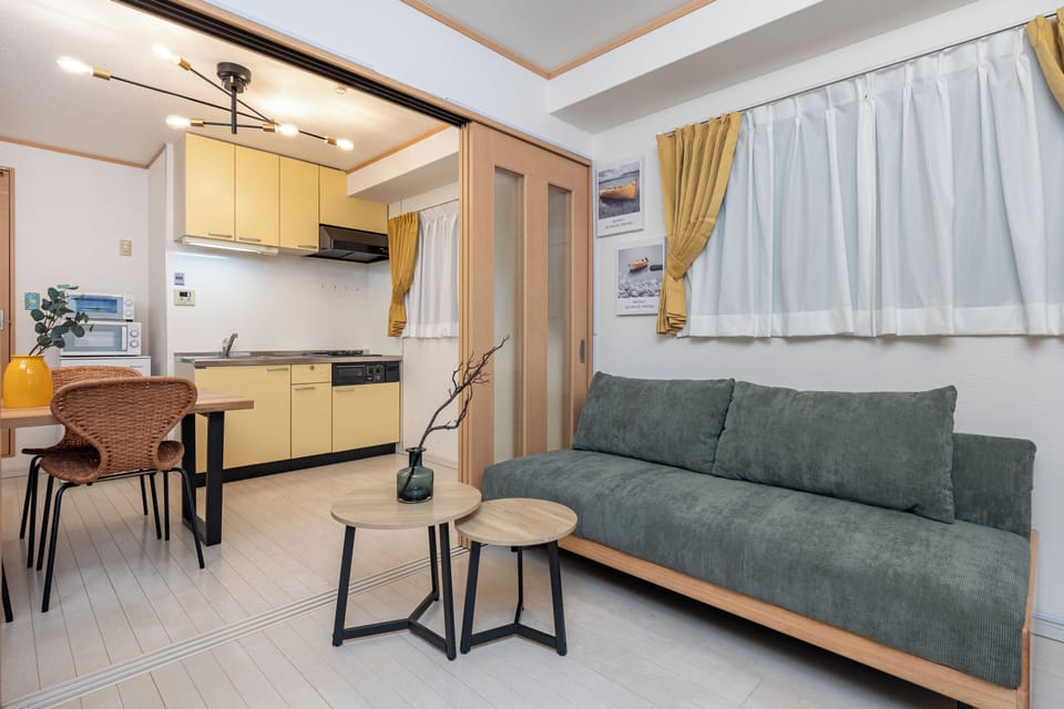 Deluxe Apartment | Living area | Flat-screen TV
