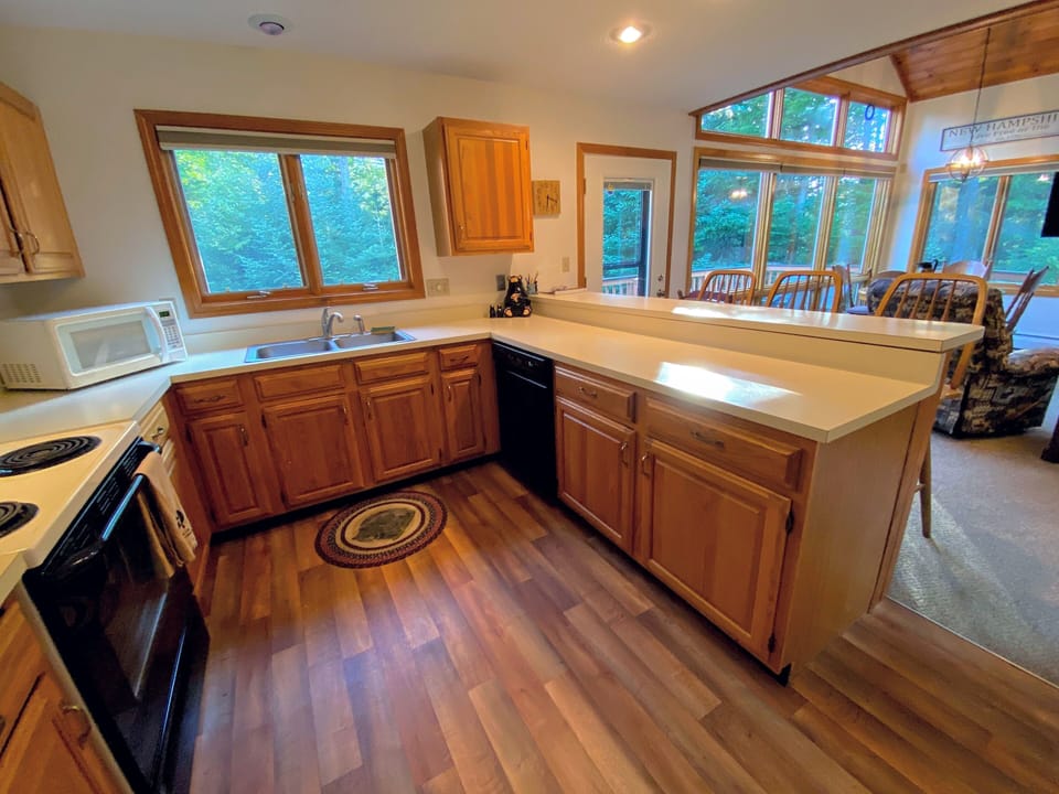 The kitchen is fully stocked for all your cooking needs and offers a coffee maker.