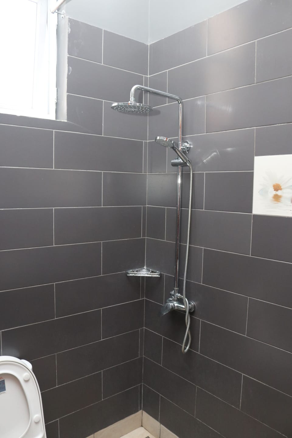 Standard Single Room, 1 Double Bed | Bathroom | Shower, rainfall showerhead, hair dryer (on request), towels