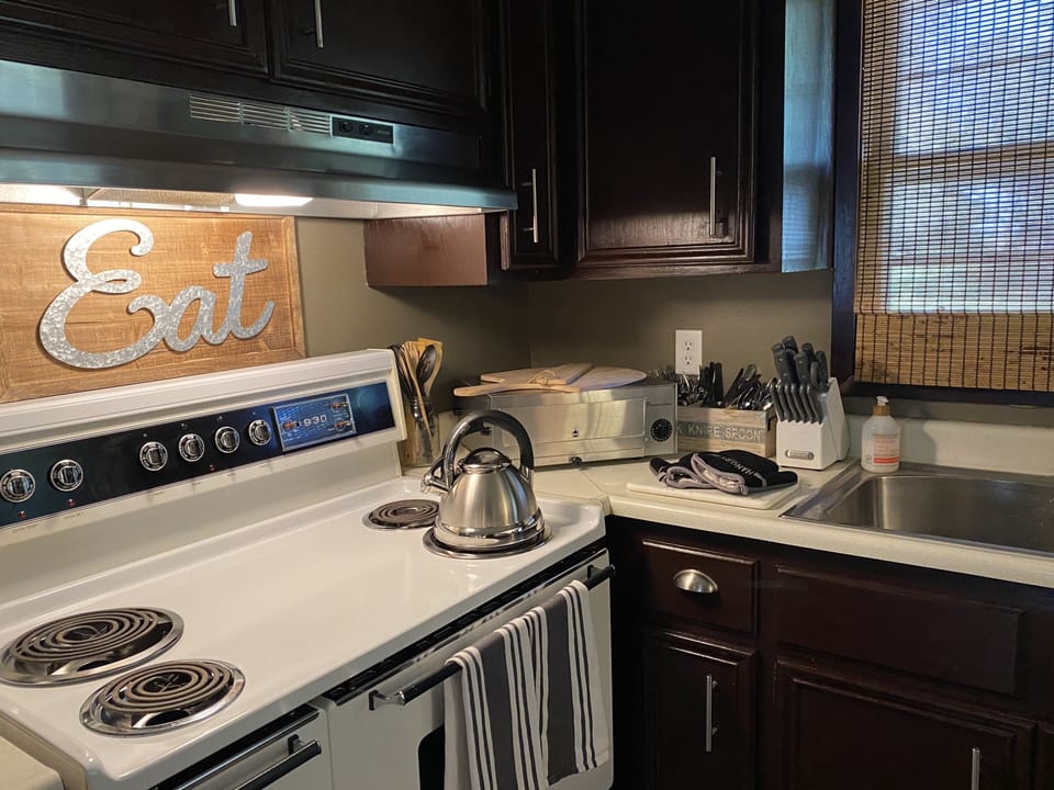 kitchen had large 40” stove. Pizza oven, microwave, Keurig, dishes & flatware 