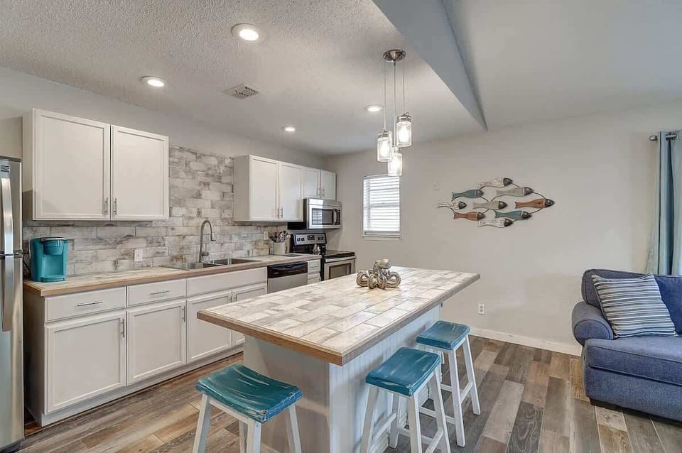 Open Living, Kitchen, and Dining. 