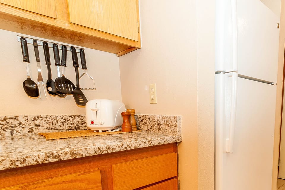 Condo, 2 Bedrooms | Private kitchen | Oven, cookware/dishes/utensils, dining tables