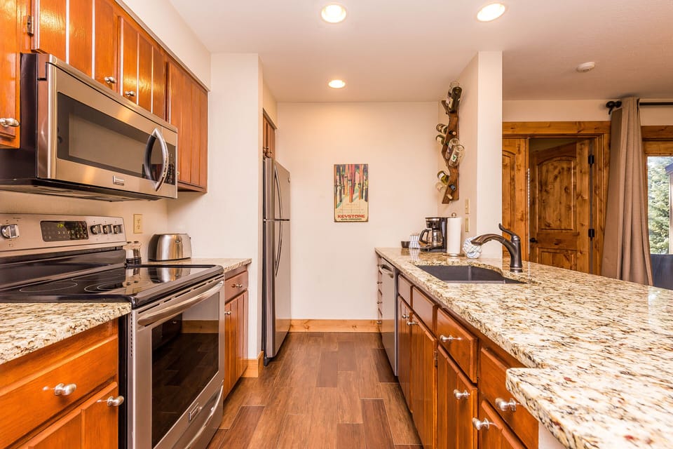 Condo, 2 Bedrooms | Private kitchen | Microwave, oven, stovetop, dishwasher