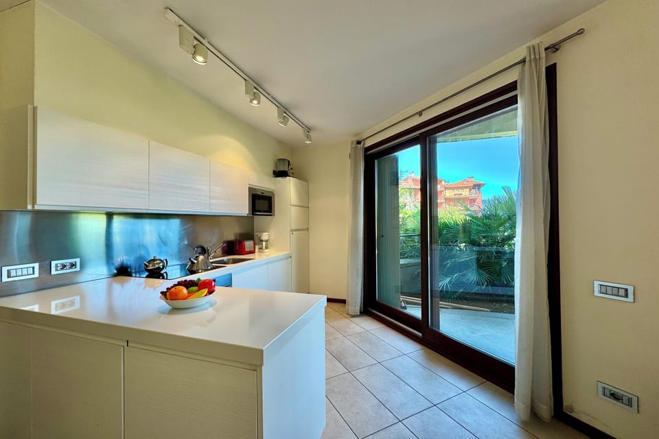 Honeymoon Apartment, Multiple Bedrooms, 2 Bathrooms, Mountainside (La Perla Di Sonenga - Giardino) | Private kitchen | Microwave, oven, stovetop, dishwasher